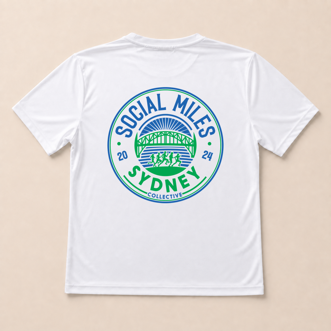 Back view of the white Social Miles Sydney performance tee with the large blue and green circular Social Miles Sydney crest.