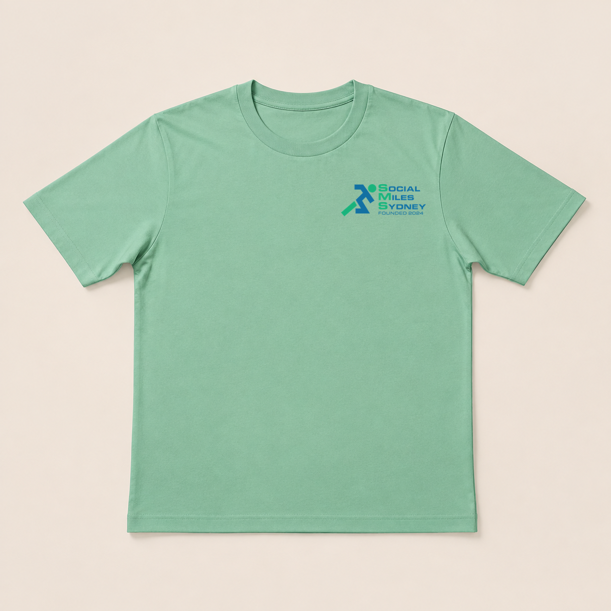 Front view of the mint Social Miles Sydney tee with the blue and green Social Miles Sydney running figure mark at the chest.