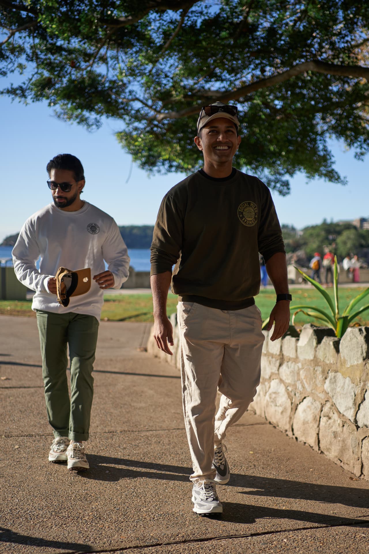 Two Social Miles Sydney members walking together near the Bay Run.