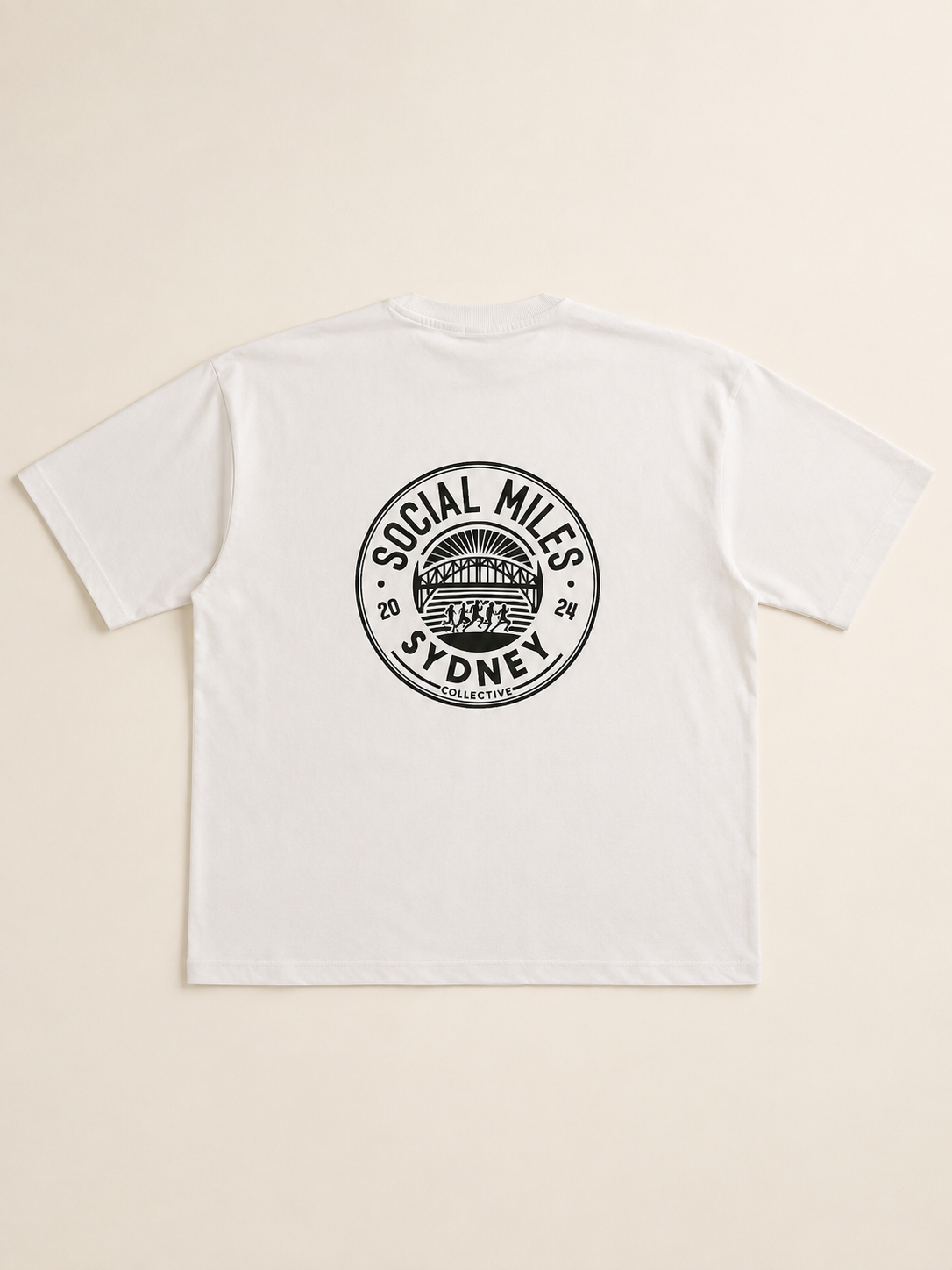 Back view of the white runSydney oversized Social Miles Sydney tee with the circular Social Miles crest.