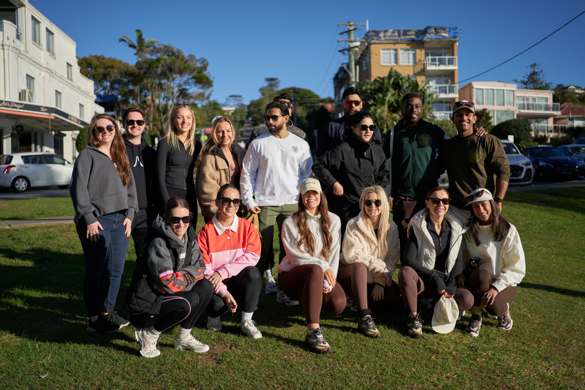 Social Miles Sydney members gathered together by the bay after a Sunday run and walk.